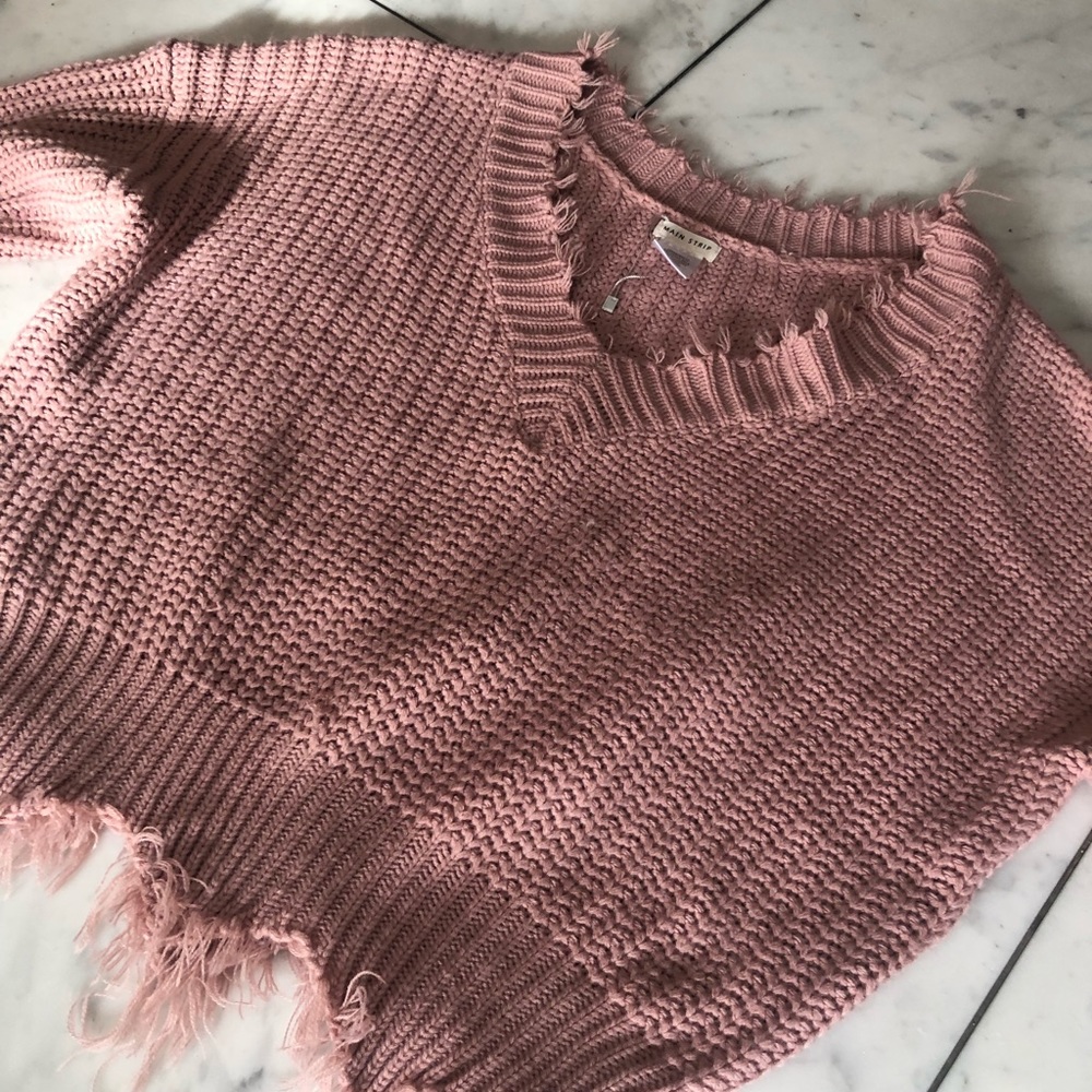 Mauve, distressed sweater.